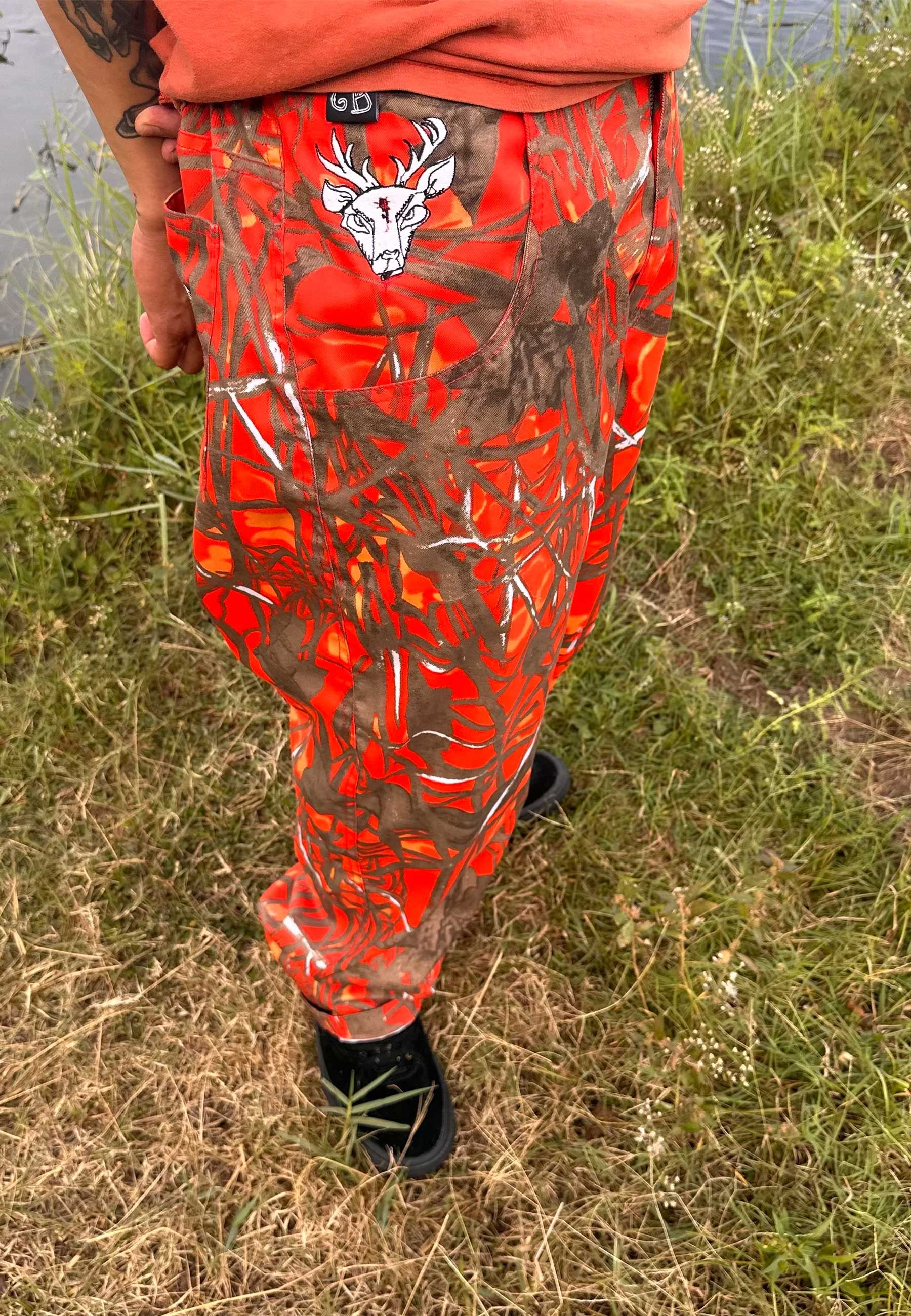 Glue Bag Loose Pants (Orange Camo)